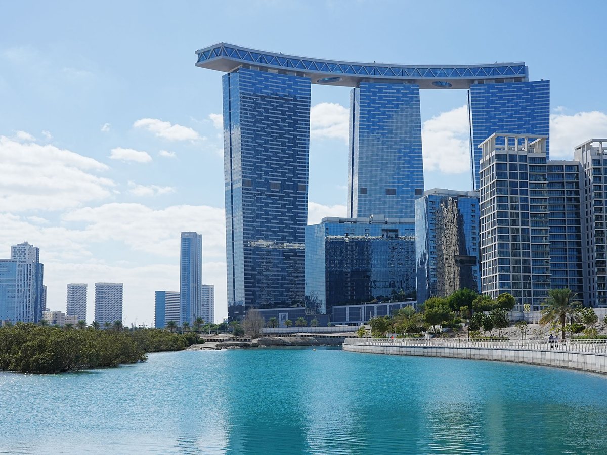 Gate Towers and the Arc on Al Reem Island, Abu Dhabi, seen across the water on a clear day